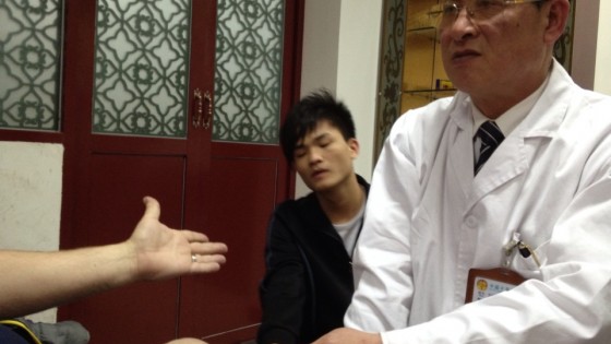 A doctor of Chinese medicine, diagnosing me